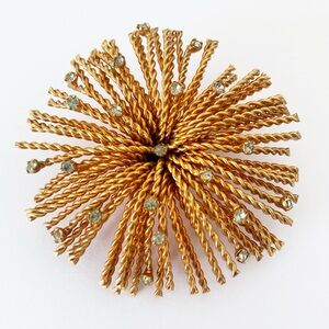 Vintage signed Ciro Goldtone starburst Brooch with Rhinestones